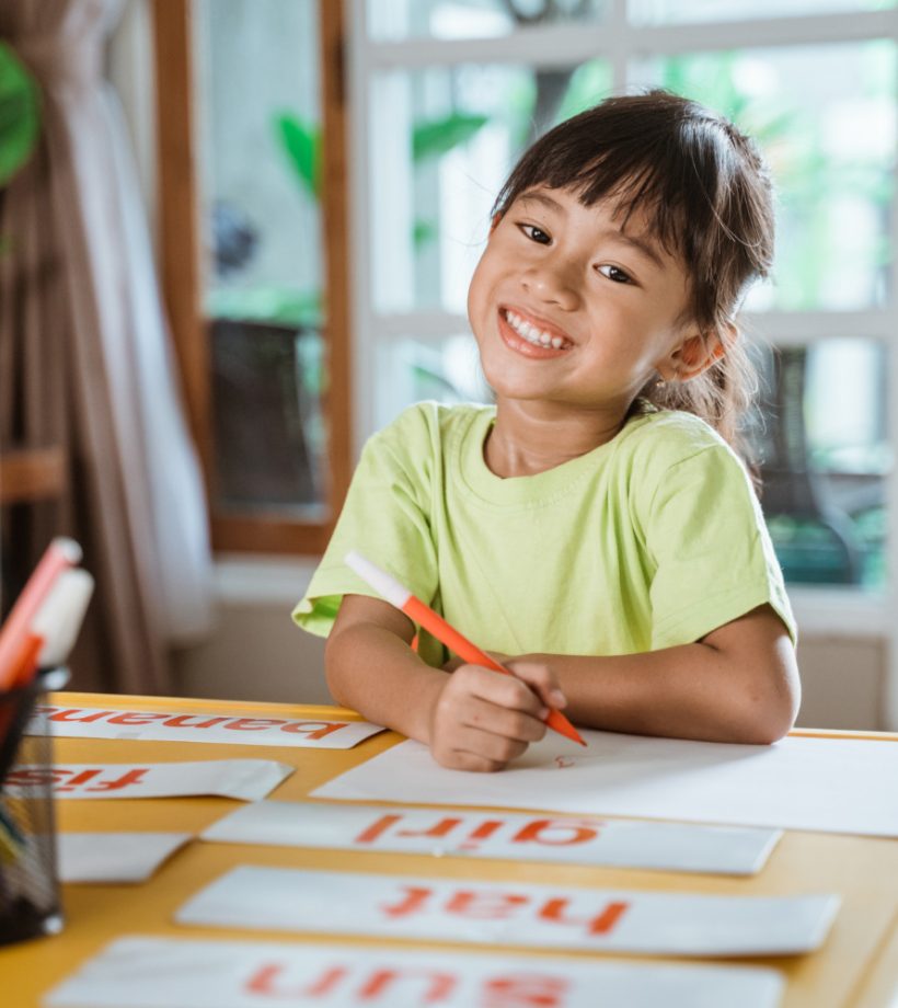 child studying english