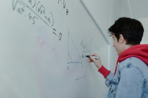 child studying secondary math